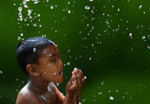Child in bath, clean water - WOIMA Corporation